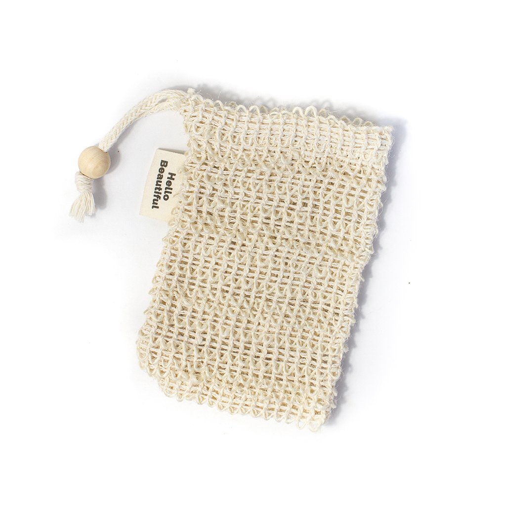 Natural sisal soap saver pouch on white background, open end up with twisted cotton drawstring and wooden bead